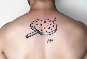 Simple tattoo with bread a cigarette and pops written tattoo idea