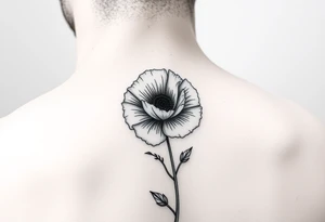 Poppy flower fine line spine tattoo tattoo idea