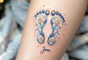 Pale blue and soft yellow footprints of Jana, surrounded by tiny sparkles to highlight her sparkling personality. tattoo idea