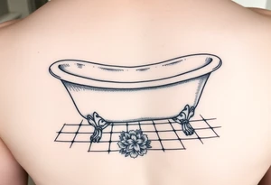 clawfoot bathtub with visible tile bathroom floor and a small bouqet of flowers on the floor tattoo idea