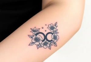 Bipolar disorder symbol with flowers and fade from color to black and white tattoo idea