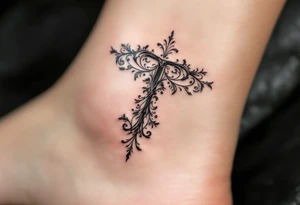 A delicate lace-like "T" in faded charcoal with a vintage feel. tattoo idea