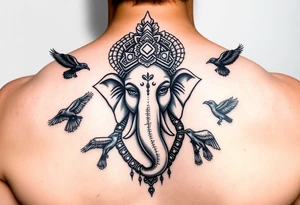 black and white Ganesha head tattoo with crows fly towards and away from him tattoo idea