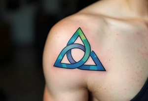 A triquetra, in green and blue tattoo idea