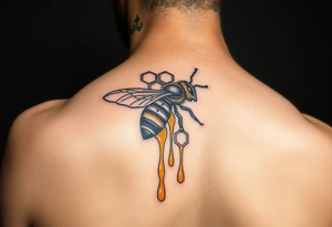 steampunk design of honeycomb with bee and dripping honey on the upper arm tattoo idea