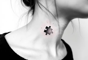 side of the neck puzzle piece tattoo where one of the pieces says Rella tattoo idea