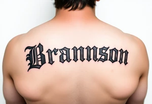 Old English lettering with red bandana accents spelling Brannon tattoo idea