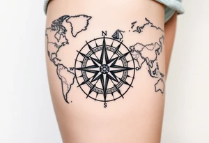 antique compass rose overlaid on weathered world map with sailing ships tattoo idea