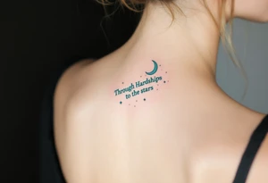 Flowing in teal ink across the spine, “Through Hardships to the stars” is crowned with a crescent moon. tattoo idea