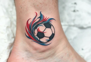 A tribal black soccer ball with intricate red and blue swirls around it. tattoo idea