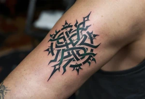 The words "never give up" woven into a celtic knot, shaded in forest green and charcoal black. tattoo idea