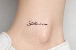 Stella erran, Maybe a medium cursive choreography on inner ankle tattoo idea