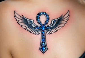 A sapphire-encrusted Ankh with silver wings, symbolizing spiritual ascension and divine wisdom. tattoo idea