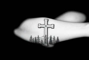 russian christian orthodox cross which is relatively small, with the diagonal line at the bottom with a light forrest with a light mountainous setting tattoo idea