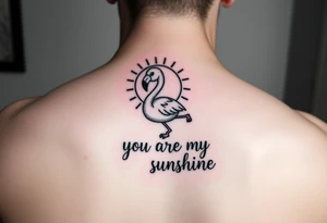 Cute cartoonish Flamingo with a sun and the saying you are my sunshine with colors tattoo idea