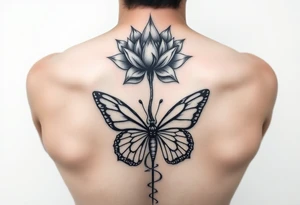 Elegant spine tattoo with lotus flower and butterfly with cracked wings mid back down tattoo idea