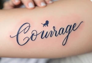 “Courage” in bold navy blue, paired with a simple lion silhouette in soft gray. tattoo idea