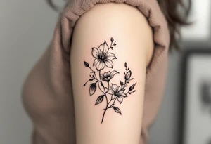 flower arrangement with spider lilies, tulip, cherry blossom tattoo idea