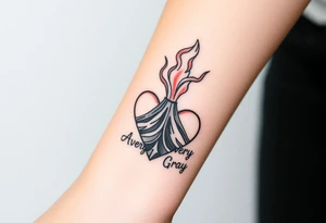 Female Geometric Volcano tattoo erupting in a heart with text Avery Gray on wrist tattoo idea