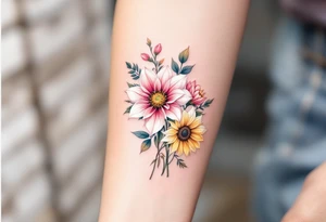 Sunflowers and stargazer lillies in pink and white in a dainty wildflower bouquet with stems tattoo idea
