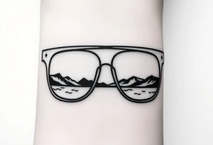 Landscape Reflecting Glasses
You can use the lenses of your glasses to depict a beautiful landscape, such as a sunset, a starry sky tattoo idea