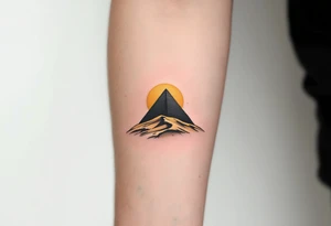 A jet-black pyramid casting a shadow over a golden sand dune. tattoo idea