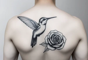 Debby Deguzman with a humming bird and a rose tattoo idea