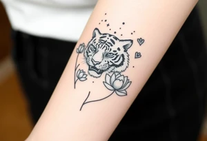 fierce tiger emerging through blooming lotus flowers in mist tattoo idea