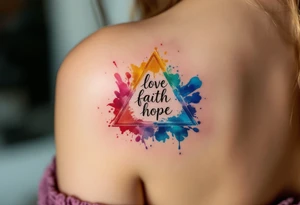 Words love faith hope arranged in a triangle, each corner marked with a watercolor splash—rose red, ocean blue, and golden yellow. tattoo idea