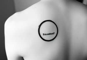 "Black circle tattoo (3cm) with barely visible 'To be continued?' around edge. Like a punctuation mark on skin." tattoo idea