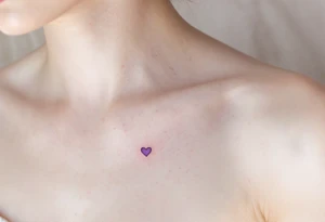 Matching tiny hearts shaded in lavender, placed delicately on collarbone of each partner. tattoo idea