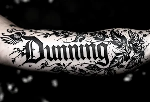 Dunning, left forearm details include angel wing, greek type of font,jungle leaves , tiger claw scratch tattoo idea