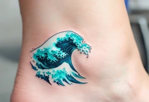 A turquoise wave crashes in delicate linework on the ankle, accented with silver highlights. tattoo idea