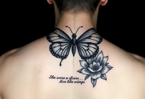 butterfly with cracked wings and lotus flower with quote that says “she wore her scars like wings” all down spine but very elegant towards lower back and small tattoo idea