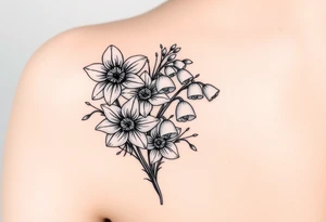 realistic daisies, daffodils, lily of the valley covering bicep for woman tattoo idea