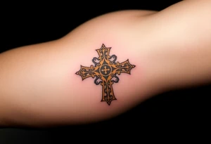 A golden Templar cross with filigree patterns, glowing against tattoo idea