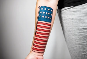 American patriotic forearm tattoo that includes the American flag, the phrase "We The People" tattoo idea