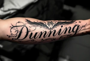 Dunning,on left arm details include angel wing, greek type of font,jungle leaves , tiger claw scratch tattoo idea