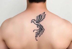 magnificent phoenix rising from golden flames with trailing embers tattoo idea