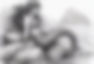 Brunette mermaid on rock tattoo idea