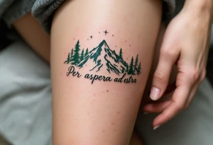 Etched in deep forest green, “Per aspera ad astra” curls around a mountain silhouette rising into a starlit sky. tattoo idea