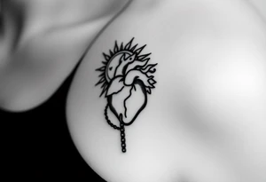 human heart chained within sun and moon tattoo idea