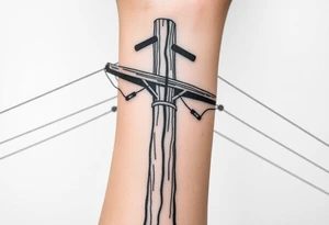 a wooden 12kv distribution pole with electrical lines. Make the pole a cross that has a hidden resemblance to god. tattoo idea