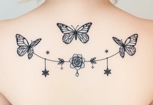 Butterflies, roses, gemstones on chains, stars tattoo idea