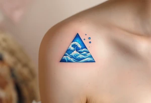 A blue triangle filled with waves and bubbles, symbolizing the element of water and emotion. tattoo idea