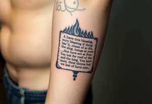 A large burning scroll of a bible scripture about new blessing and lost of a love one tattoo idea