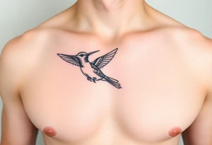 small, manly, and minimalist hummingbird on upper left side of the chest tattoo idea