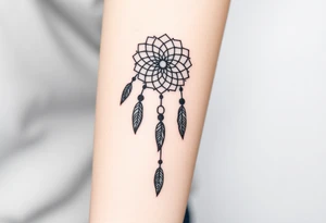native dreamcatcher with flowing feathers and sacred beads tattoo idea