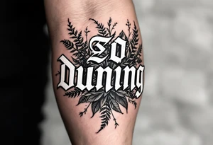 Dunning, left forearm details include angel wing, greek type of font,jungle leaves, name is big and in white color tattoo idea