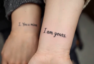 “I am yours” in soft gray on her wrist and “You are mine” in black on his neck symbolize mutual belonging. tattoo idea